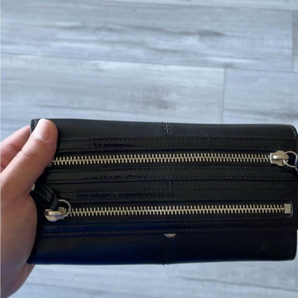 Coach Black Leather Wallet with Minimalist Design